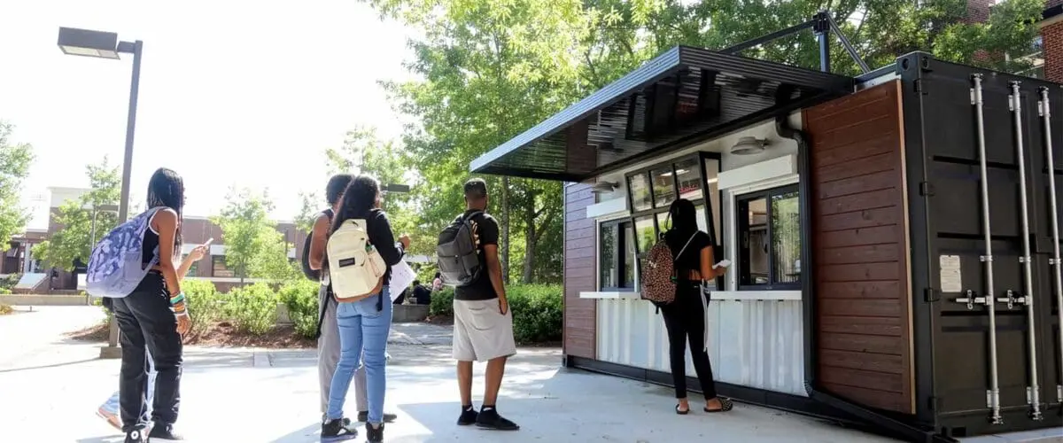 A line of students waiting outside Cups-n-Cones