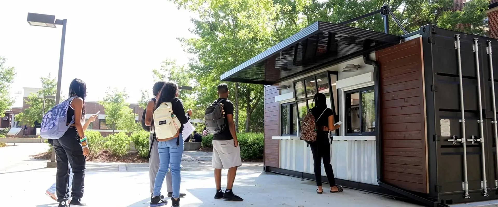 A line of students waiting outside Cups-n-Cones