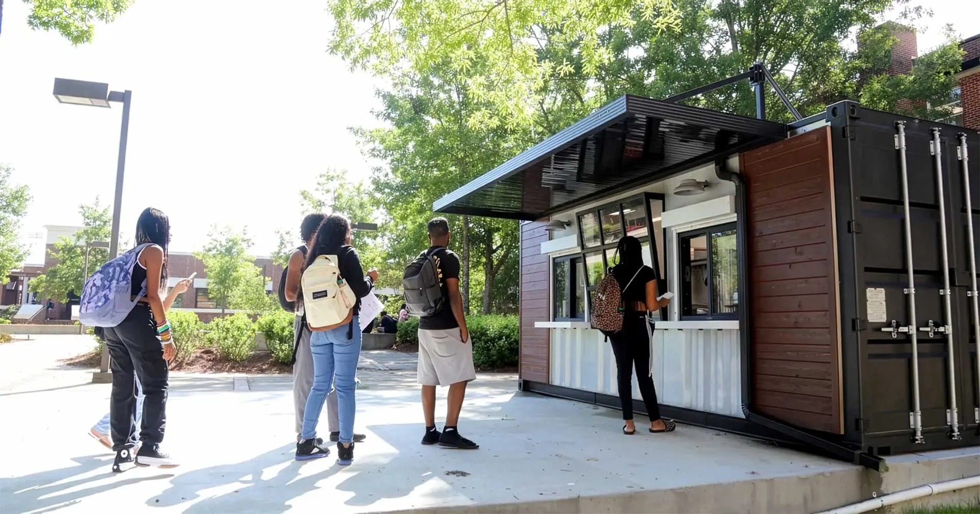 A line of students waiting outside Cups-n-Cones